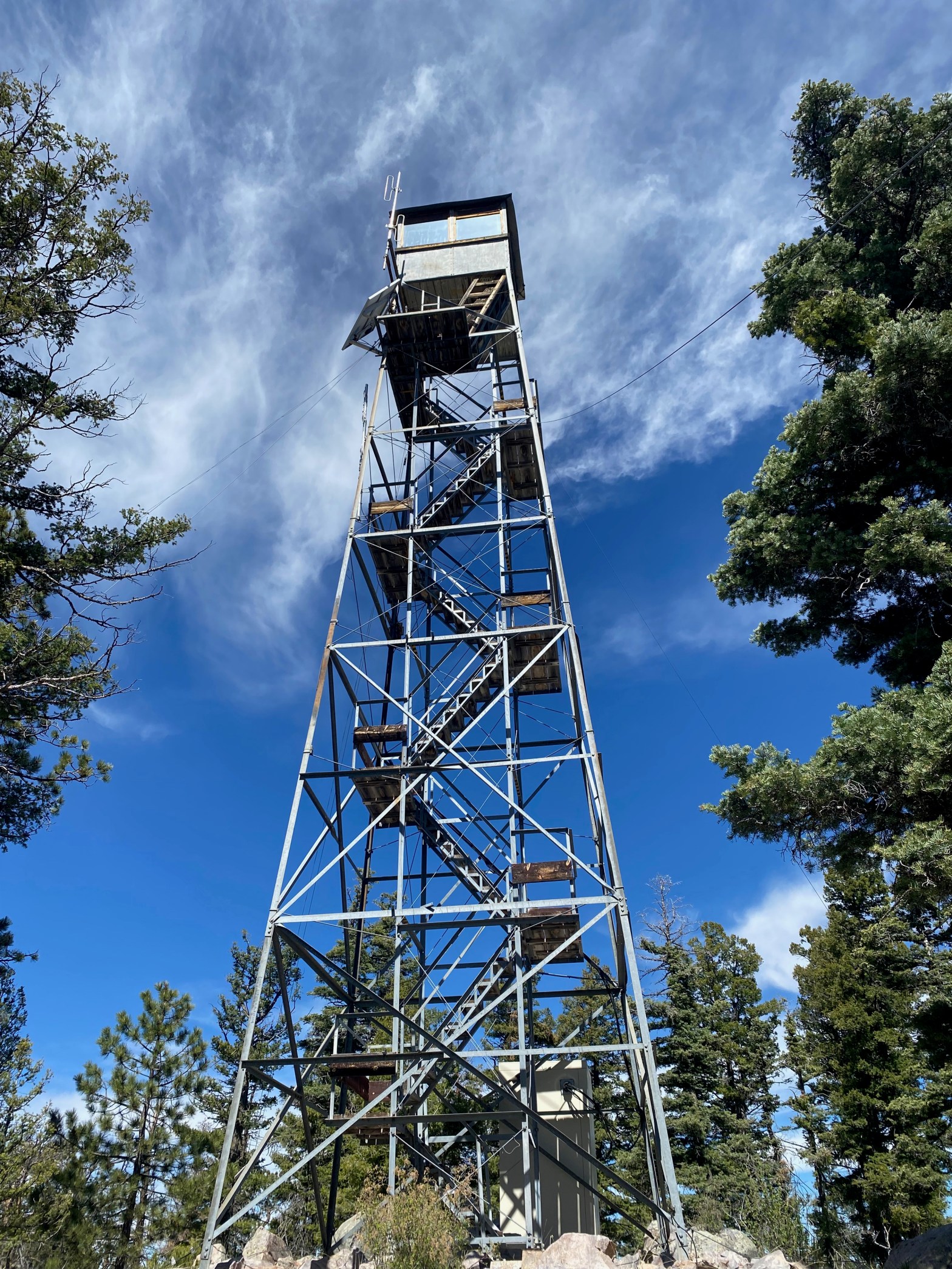 Such a beautiful fire lookout tower on a lovely summit free of all the usual communications infrastructure that often clutters up such summits. Four stars for this wonderful, easy hike.